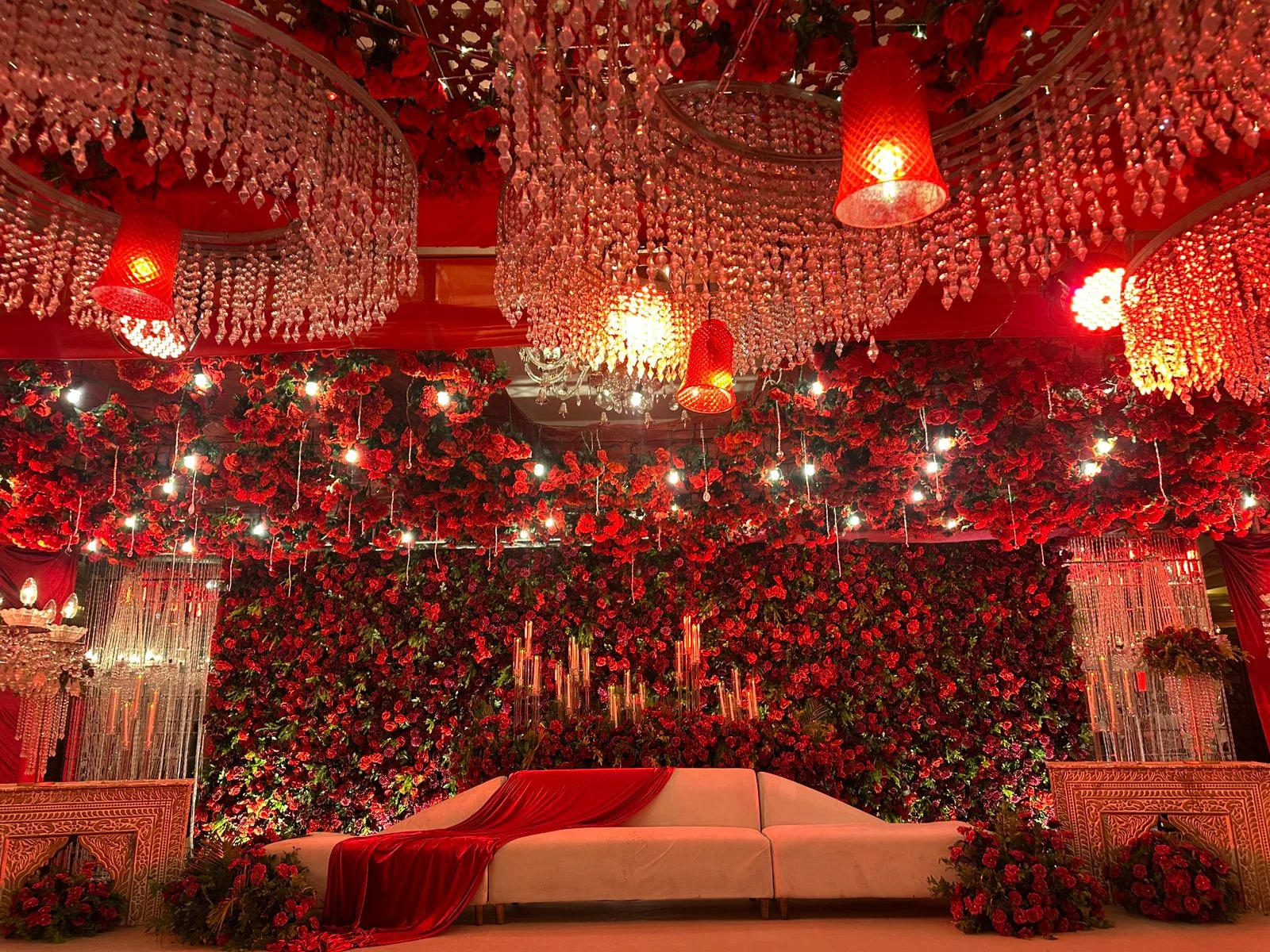 Rich red wedding stage created by MJ Events