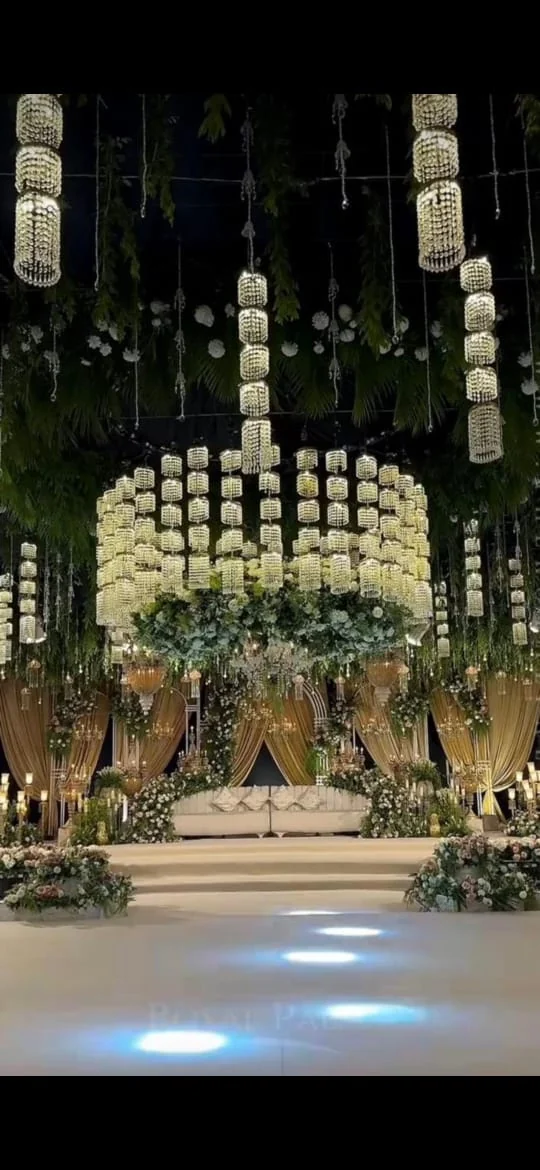 Elegant suspended lantern wedding installation