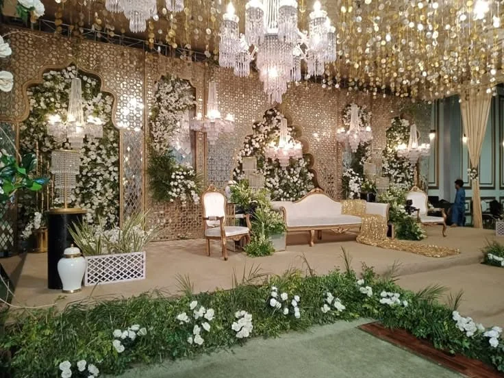 White and green floral celebration stage